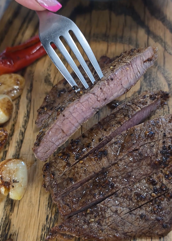 Garlic butter steak with chili and pan-fried fava beans